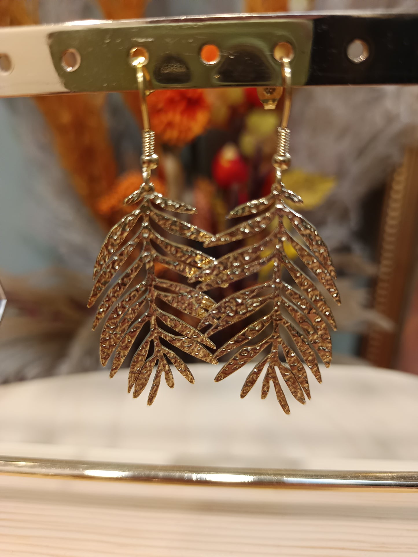 Boucles d'oreilles feuille de palmier dorées