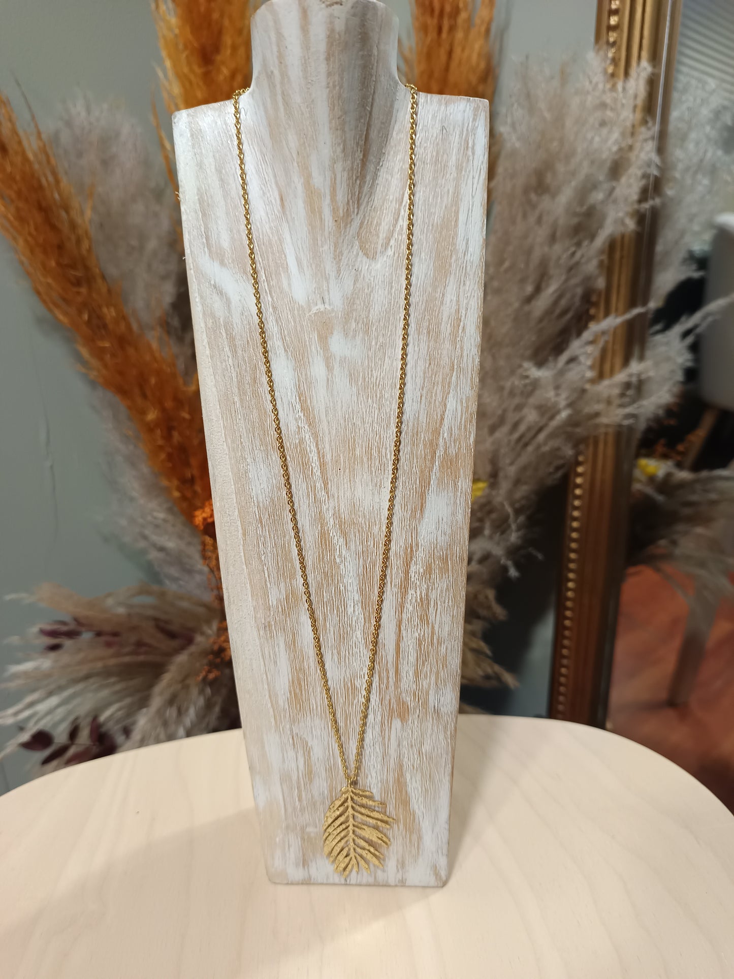 Collier feuille de palmier doré