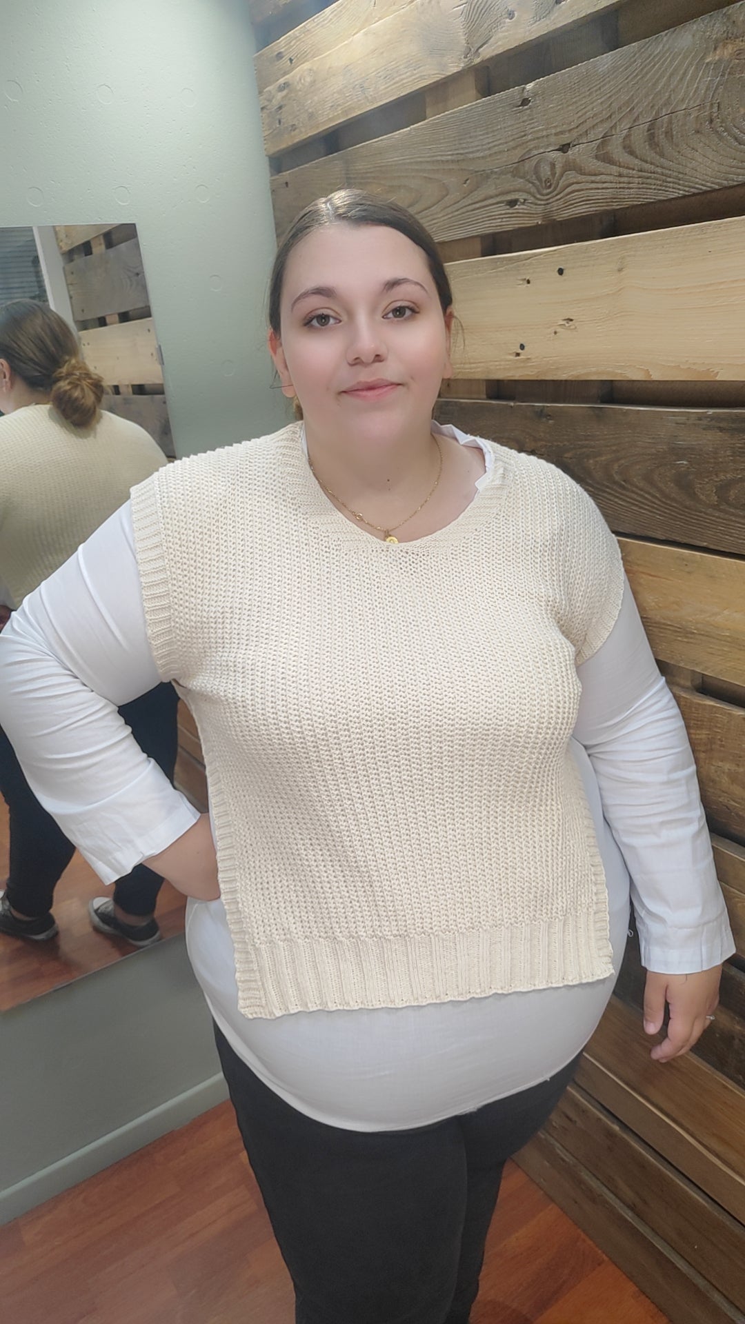 Pull sans manches avec boutons côté