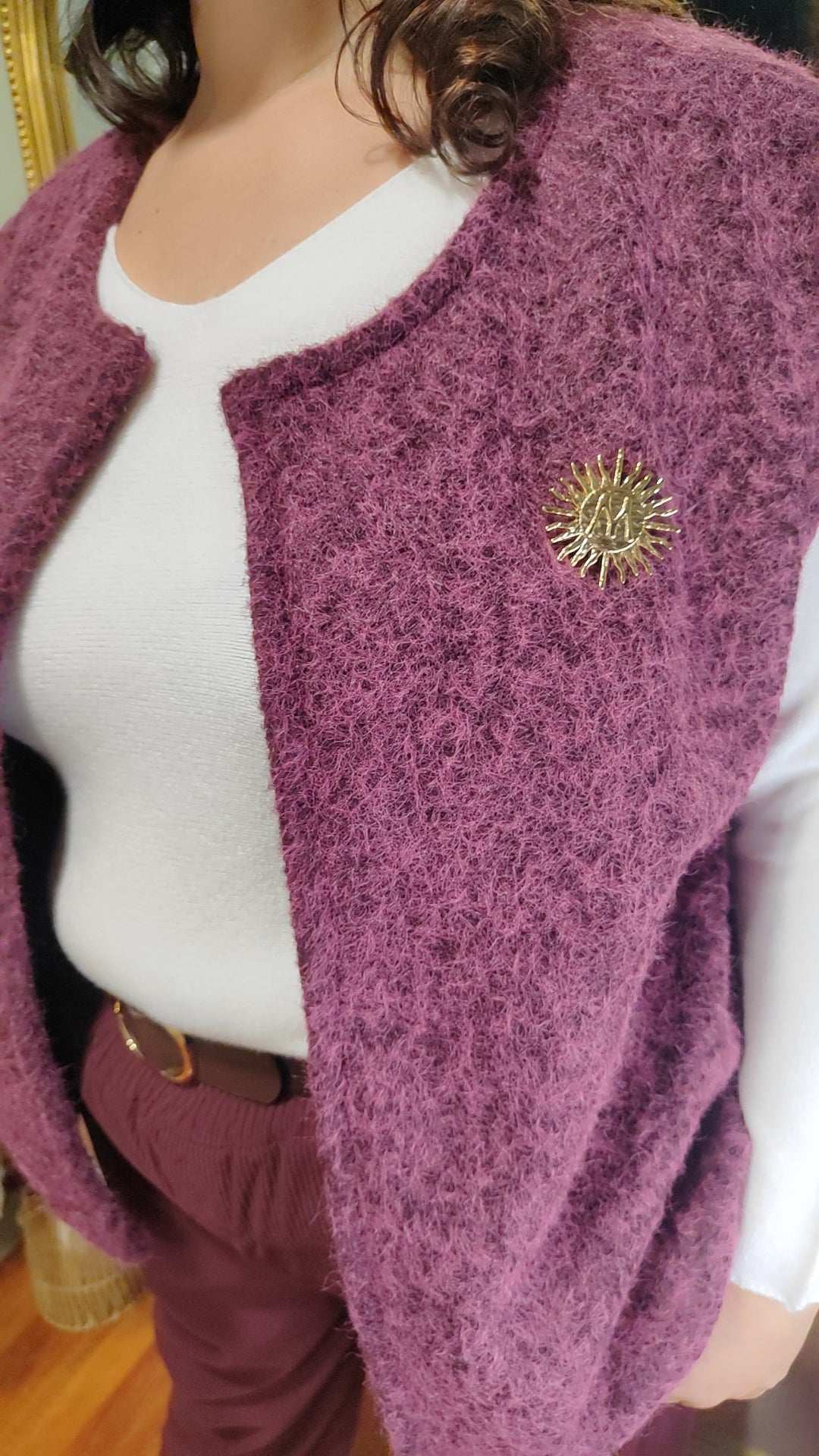 Gilet laine sans manches broche soleil