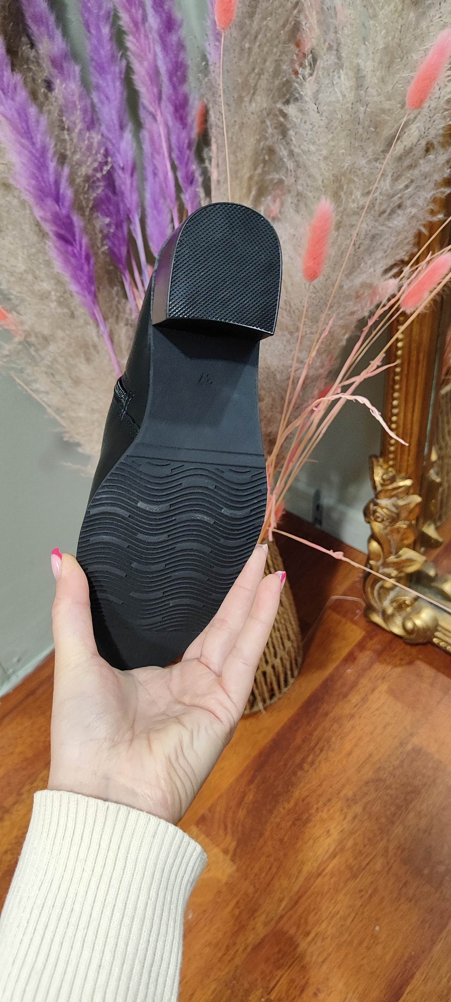 Bottines noires boucles