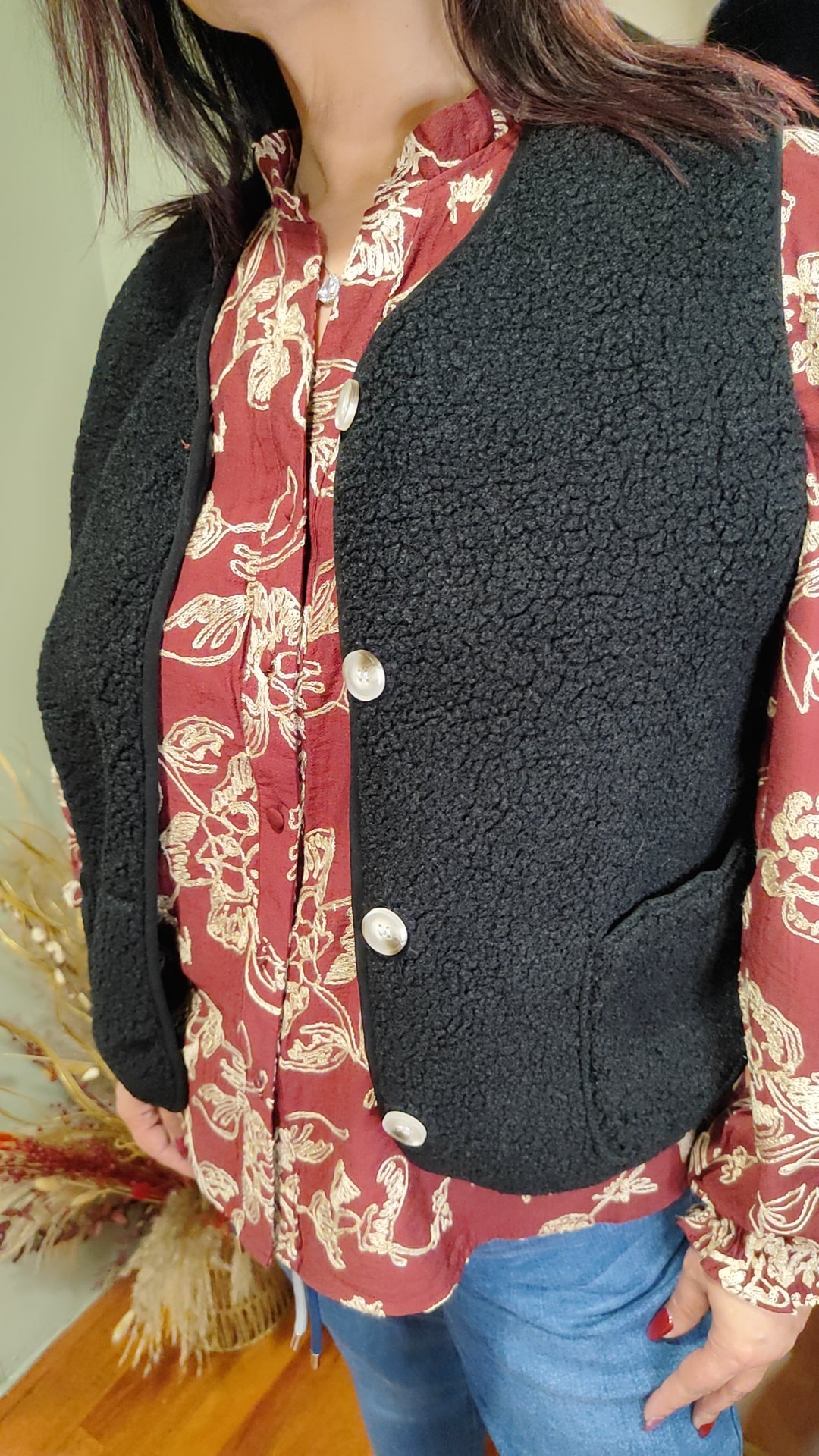Gilet sans manches à boutons et poches