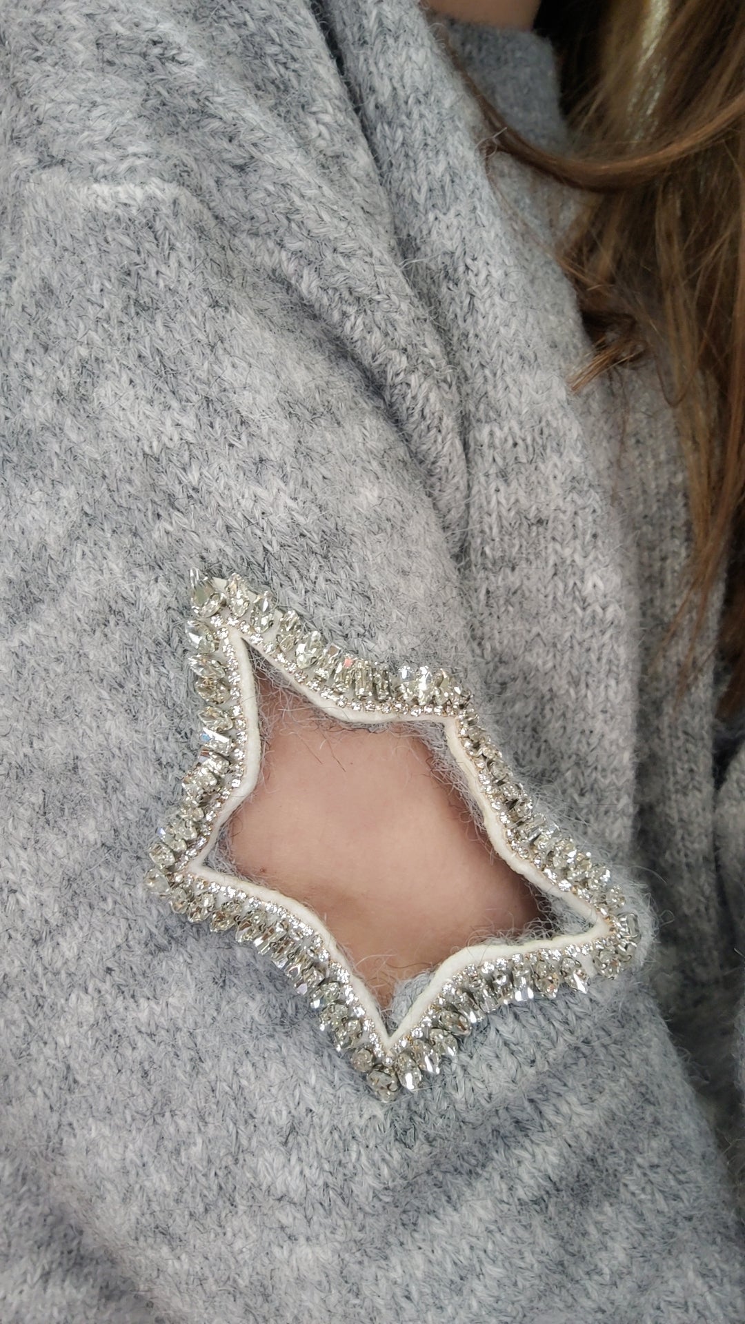 Pull gris étoile