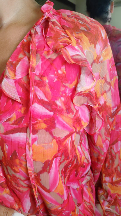 Blouse fuchsia à volants