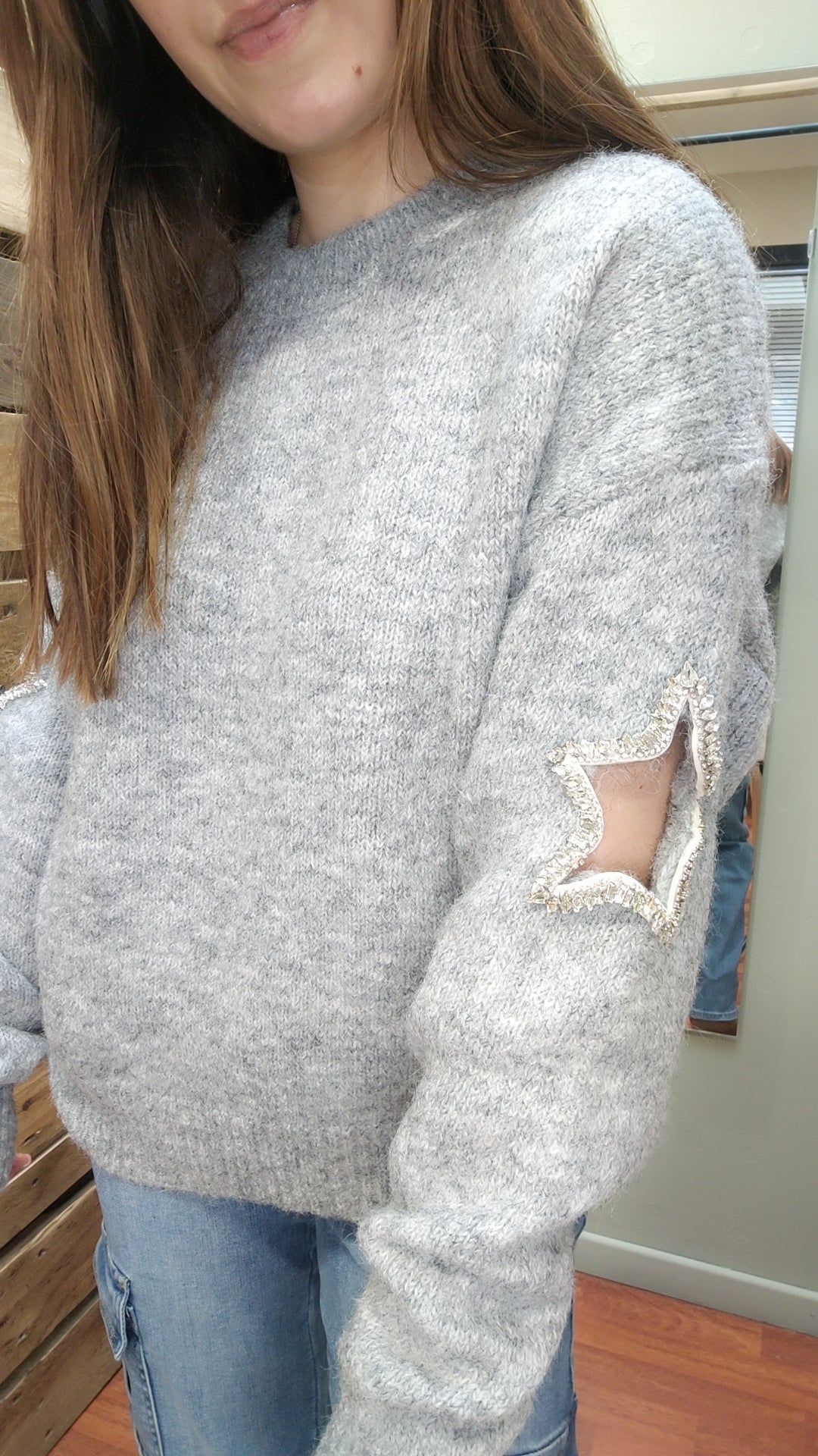 Pull gris étoile