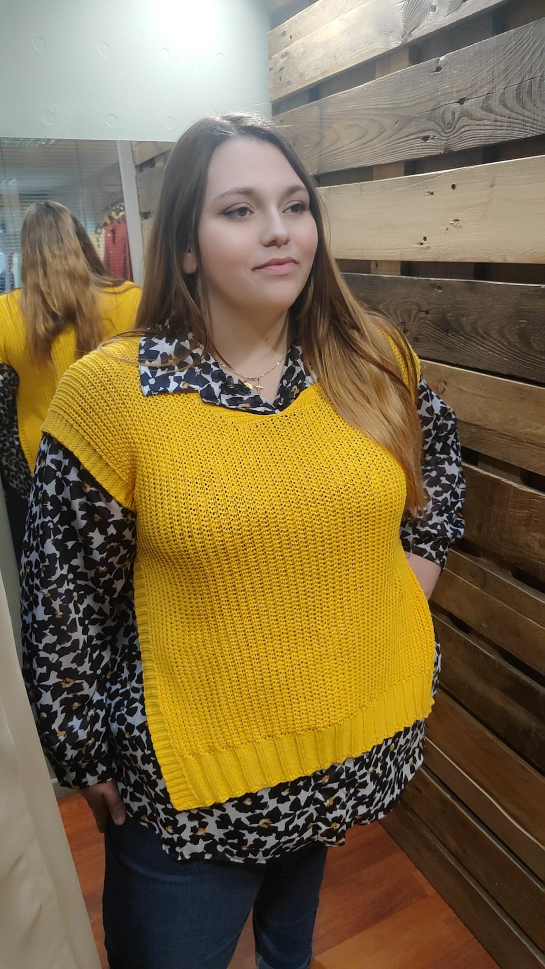 Pull sans manches avec boutons côté