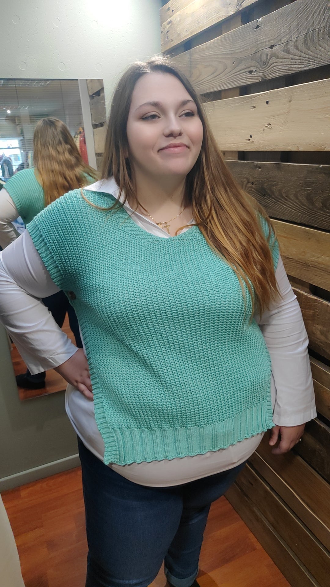 Pull sans manches avec boutons côté